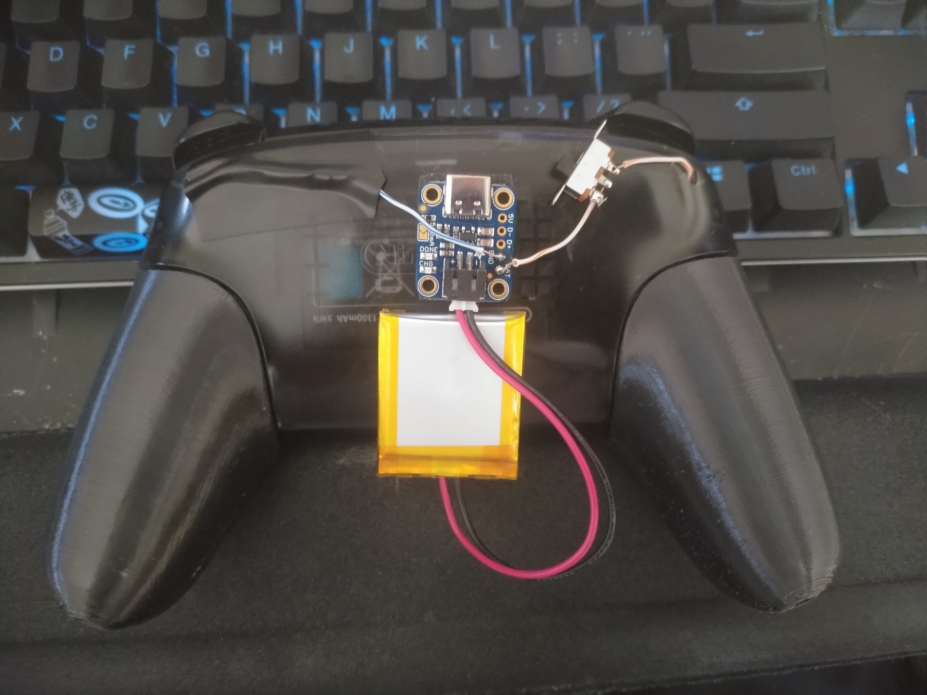 Image of the battery and charge controller on the back of the controller