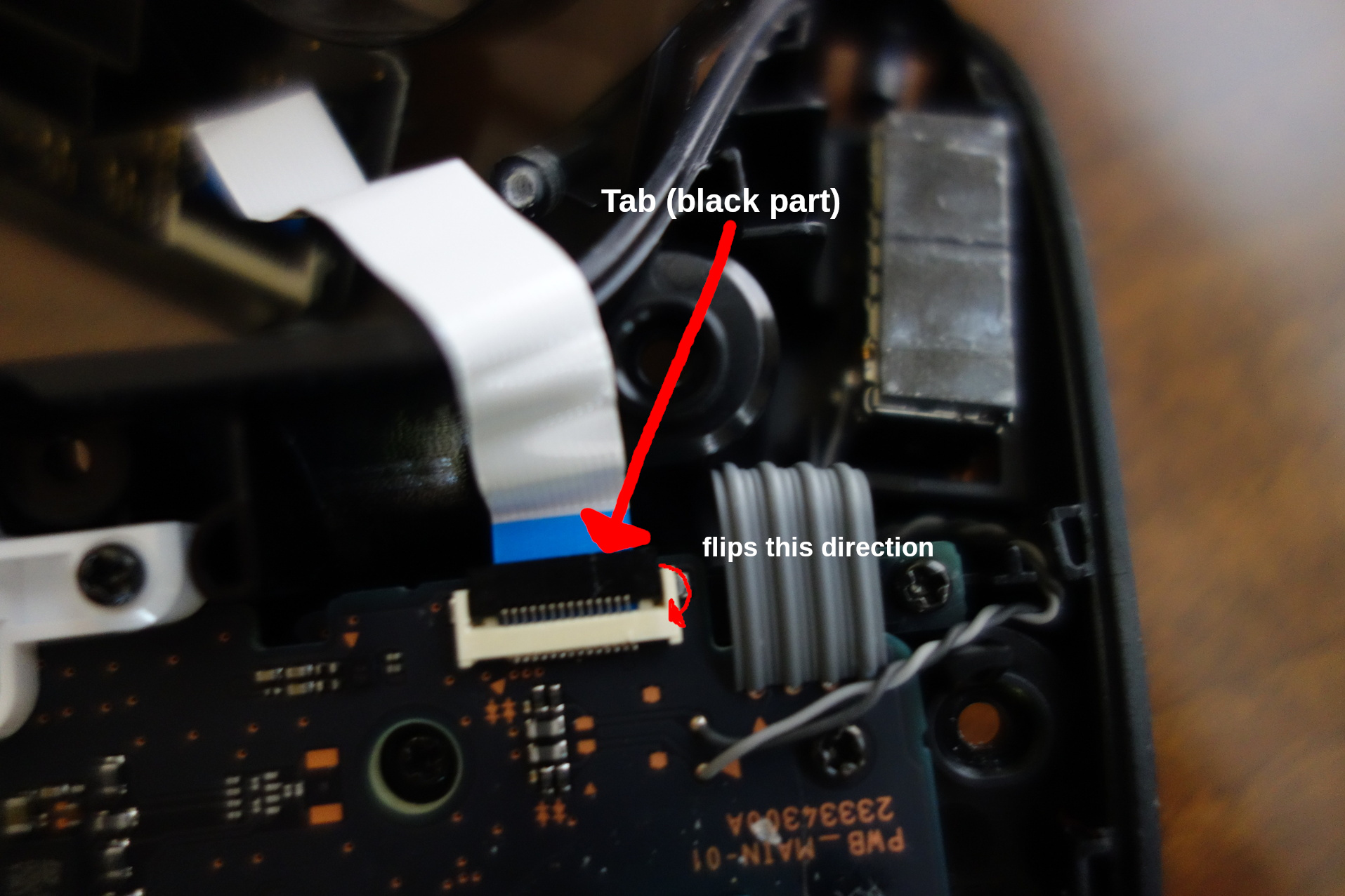 Image of ribbon cable connector with tab closed