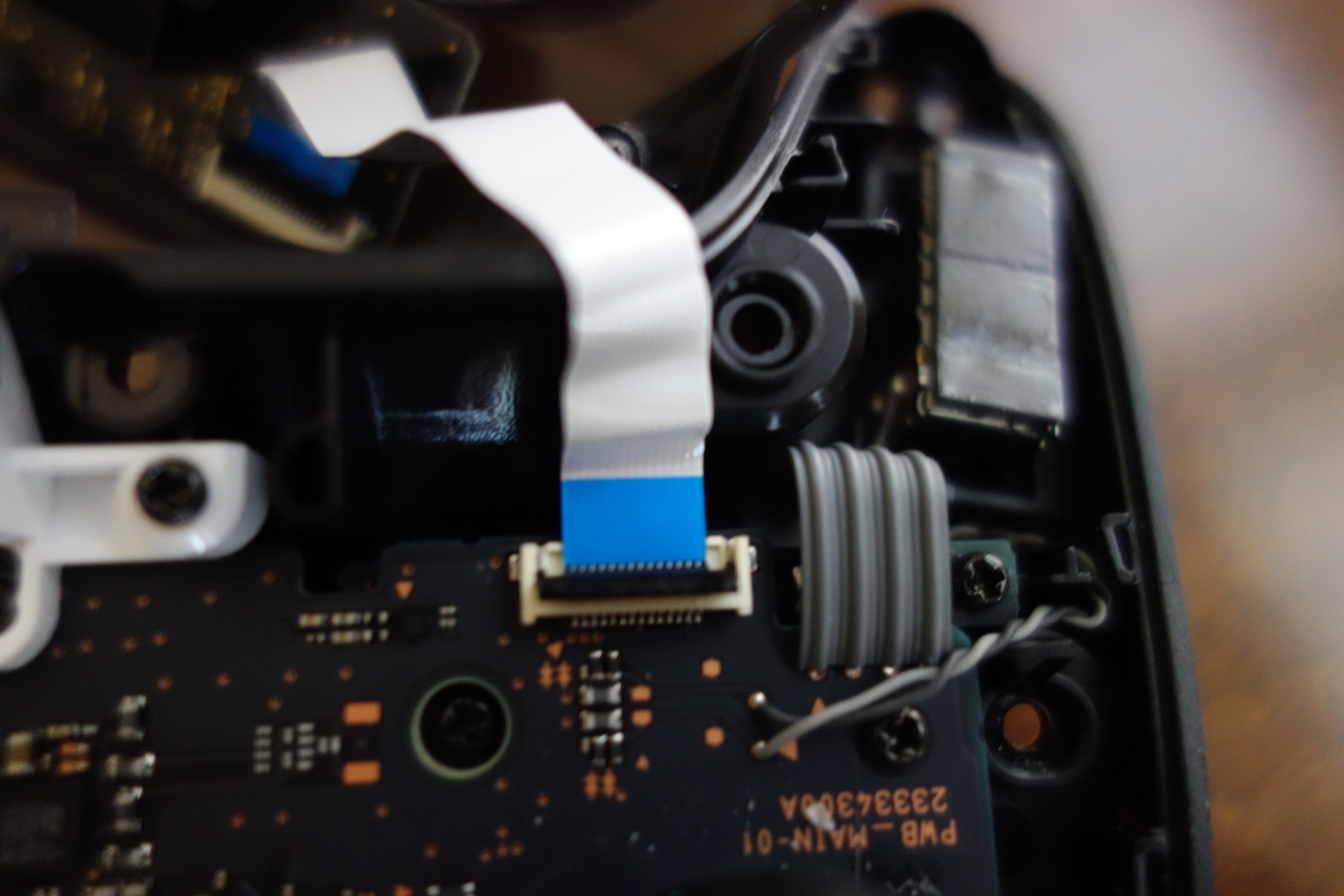 Image of ribbon cable connector with tab open
